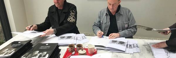 Martyn and Glenn from Heaven 17 sign the SDE interview booklets